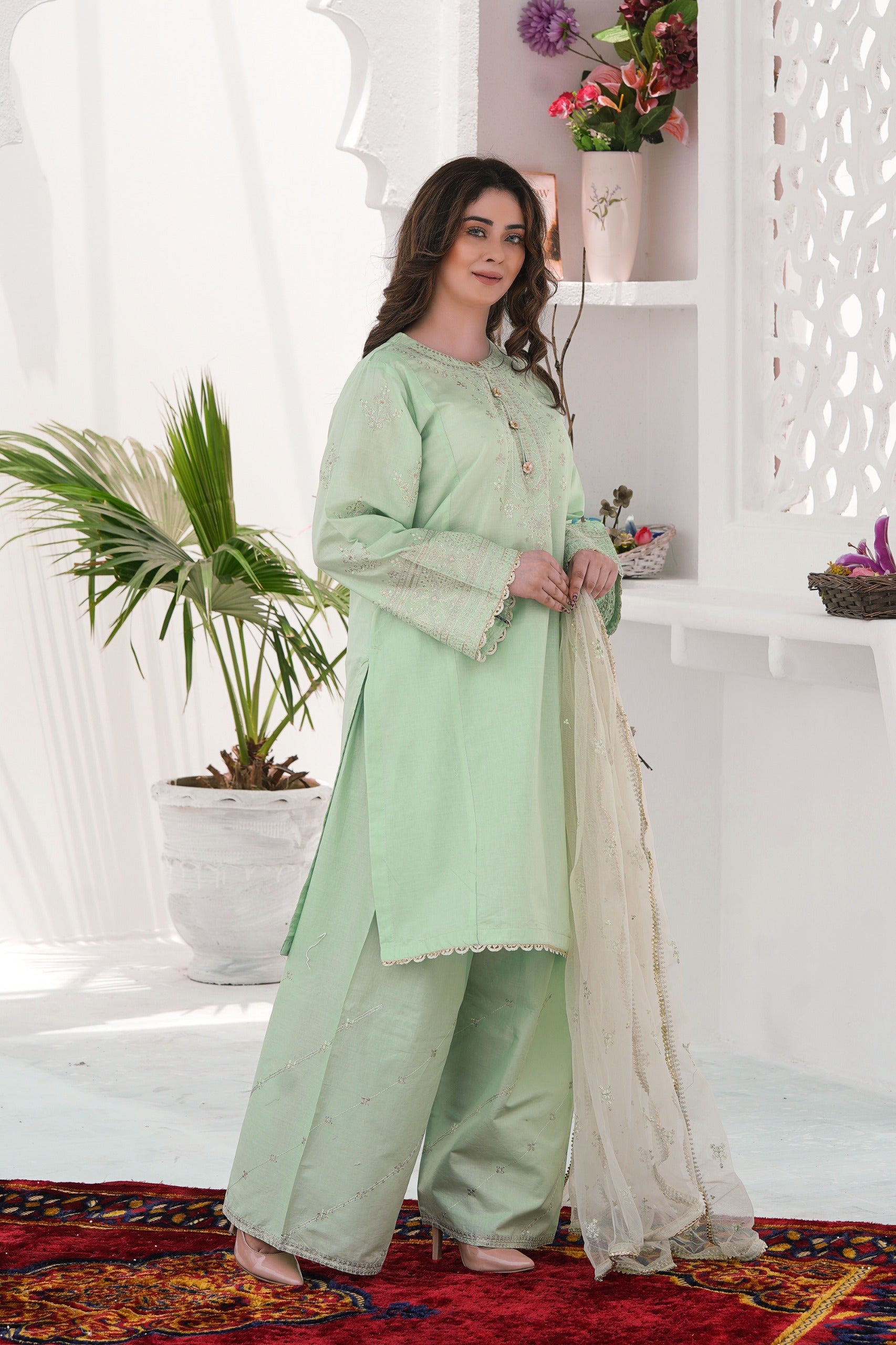 Embroidered net dupatta with lace border paired with Plant Foam 3Pc lawn dress in eggplant hue