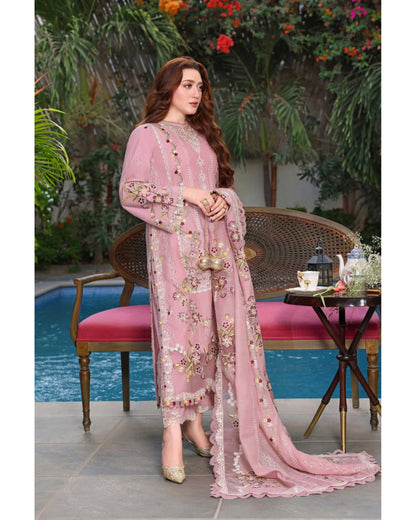 Dusty pink Dhanak suit – seated styled view
